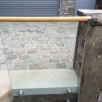 glass balustrade wooden handrail