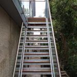 steel staircase with infinity glass balustrade blok fix